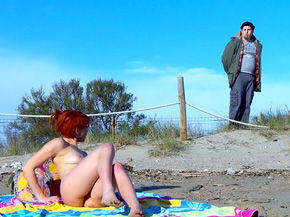 Redhead sodomized by a voyeur on the beach 2