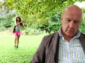 Pretty brunette empty the grandpa of balls under a tree 1